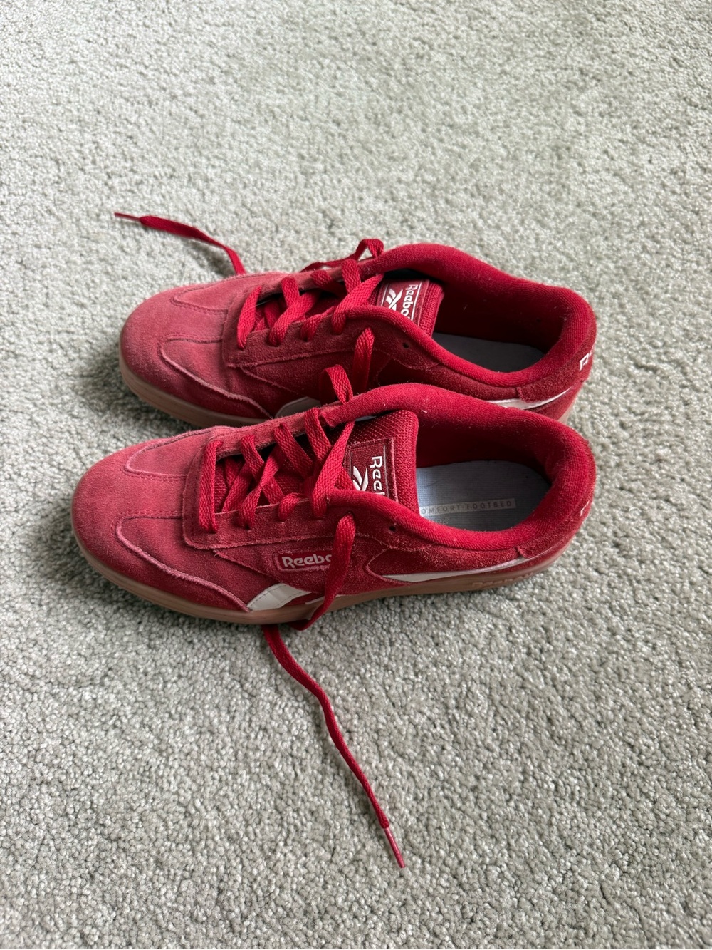 Reebok women’s Red Suede Low-Top Sneakers